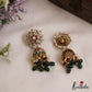 Pretty Floral Motifs Kemp Jhumkas With Green Bead Drops E1136