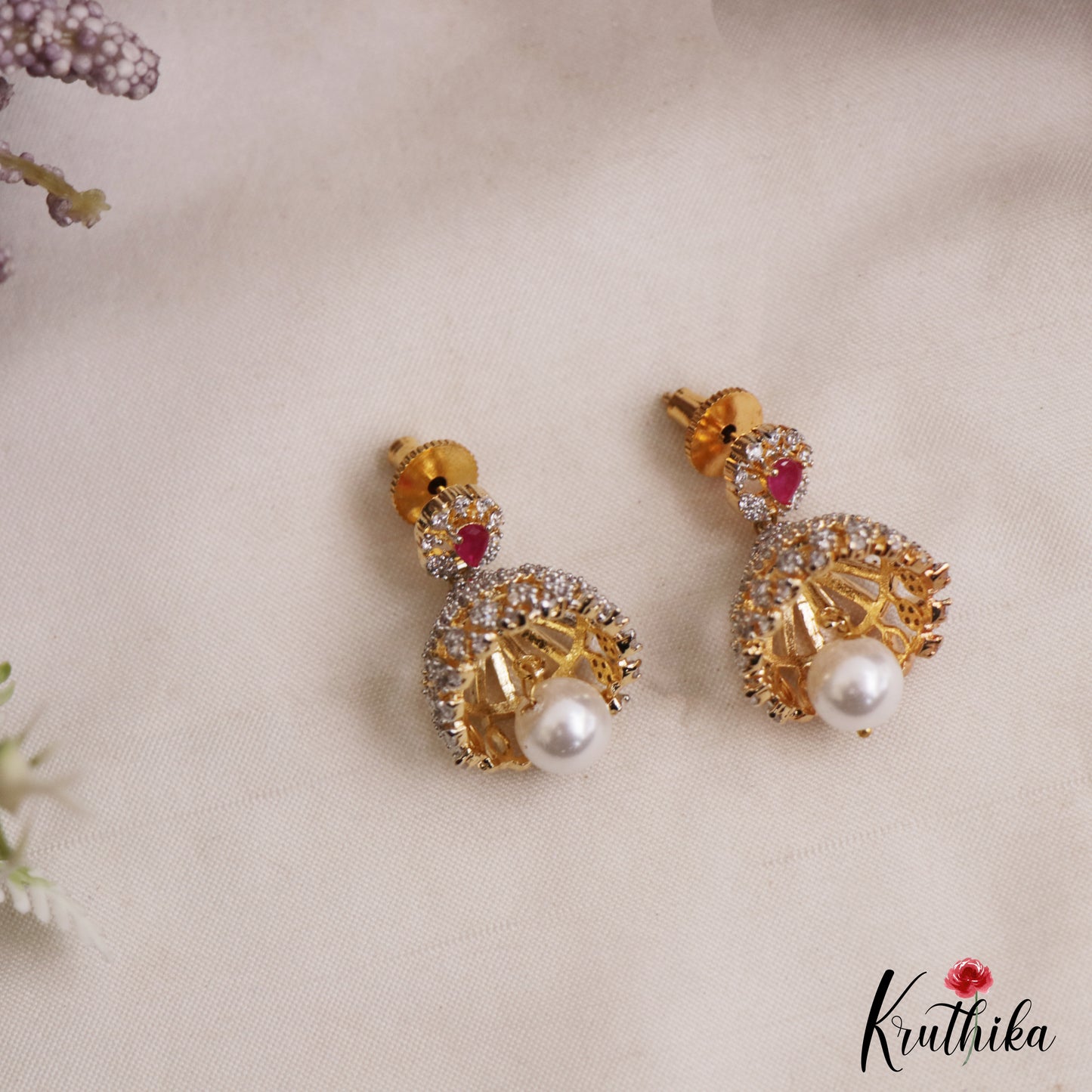 Pretty Teardrop Motifs AD Jhumkas With Pearl Drop E1097 (Available In 3 Colors)
