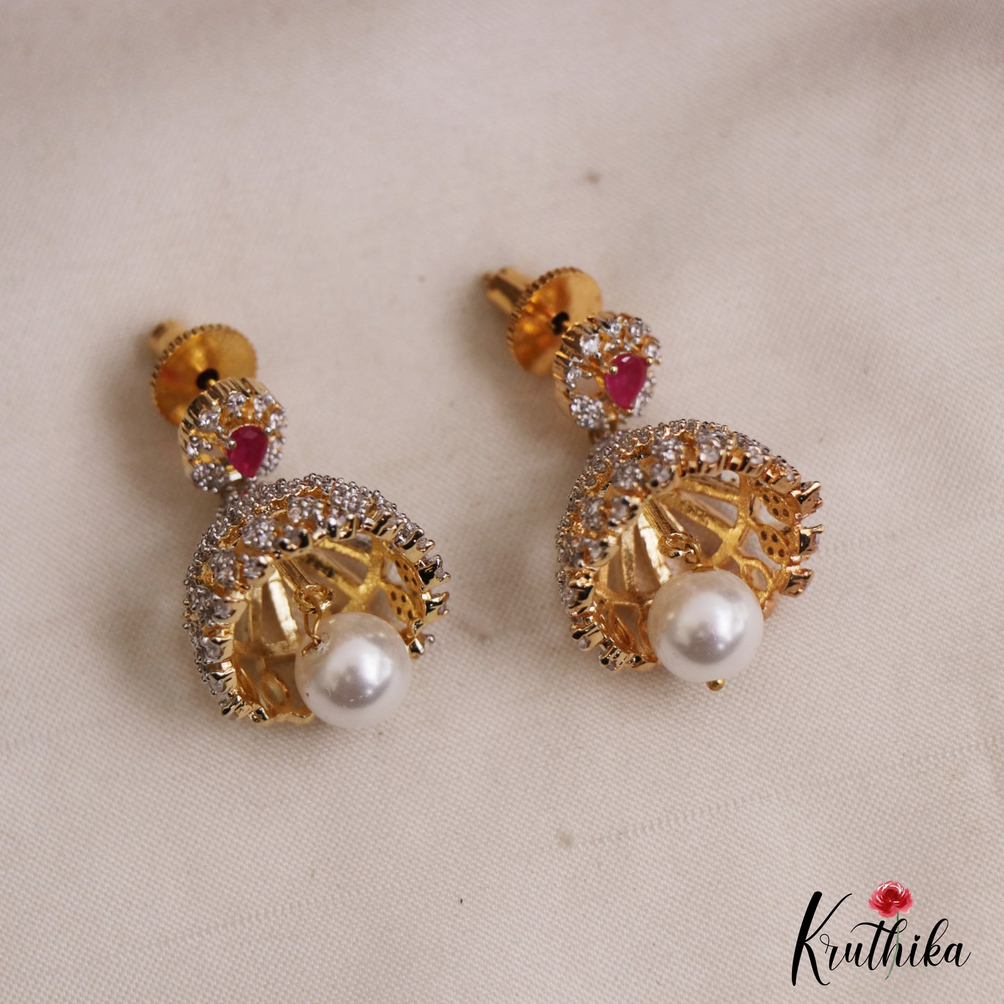 Pretty Teardrop Motifs AD Jhumkas With Pearl Drop E1097 (Available In 3 Colors)