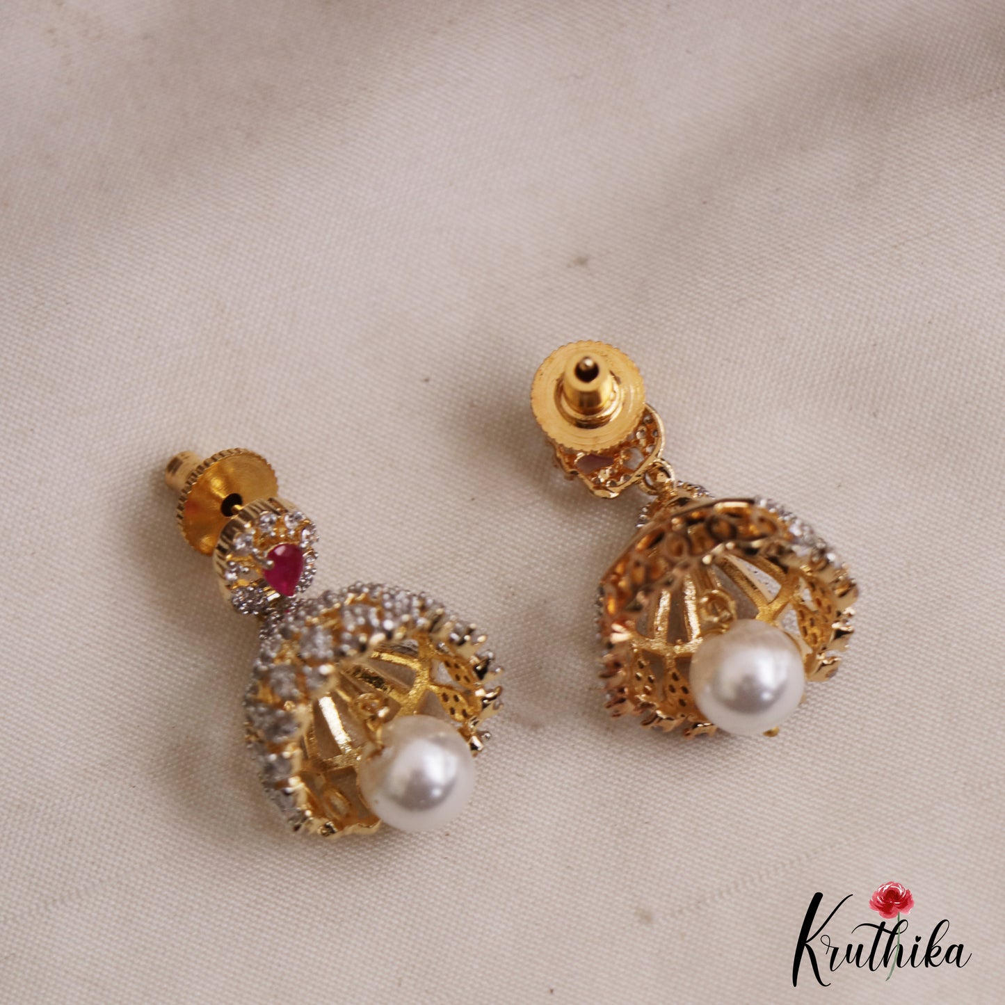 Pretty Teardrop Motifs AD Jhumkas With Pearl Drop E1097 (Available In 3 Colors)