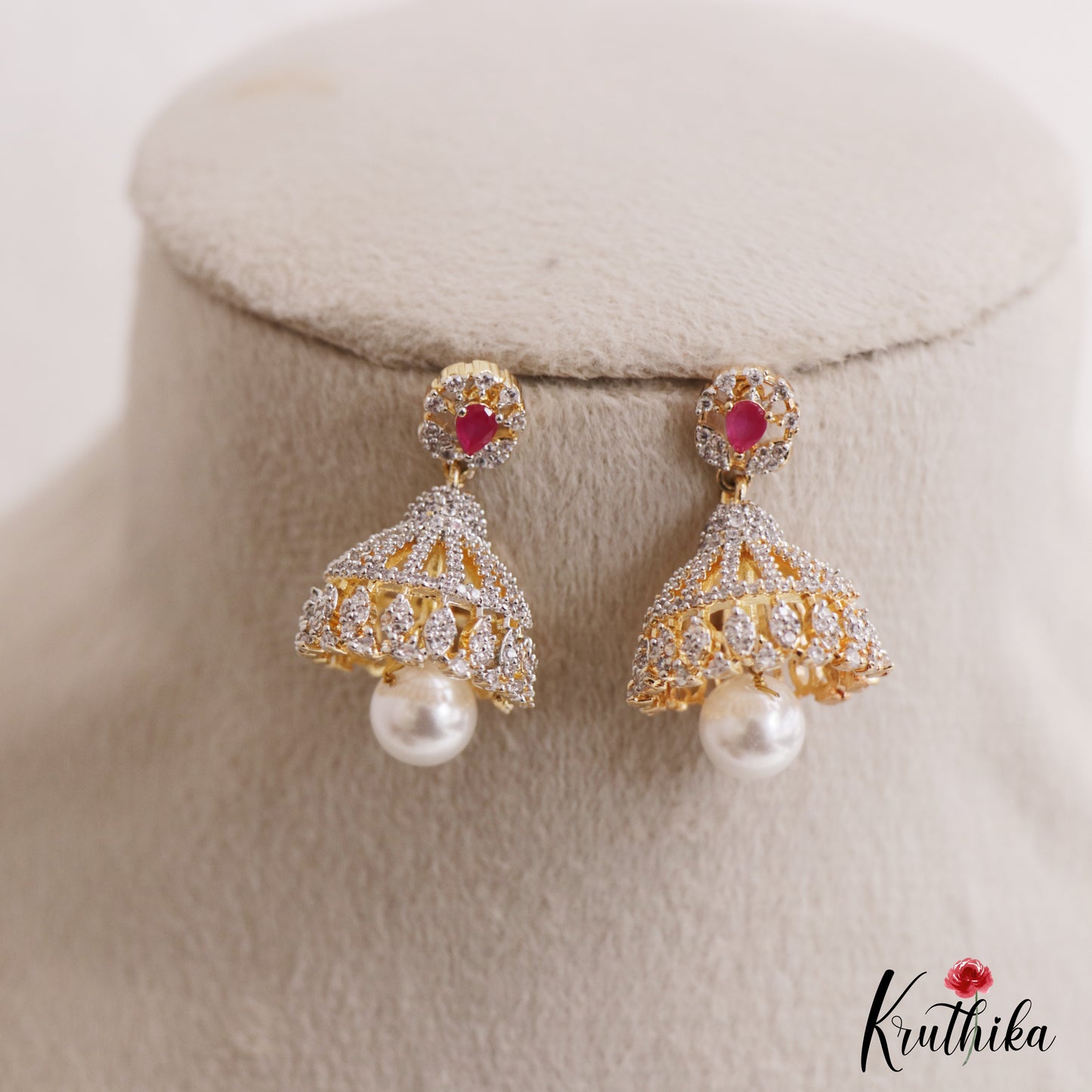 Pretty Teardrop Motifs AD Jhumkas With Pearl Drop E1097 (Available In 3 Colors)