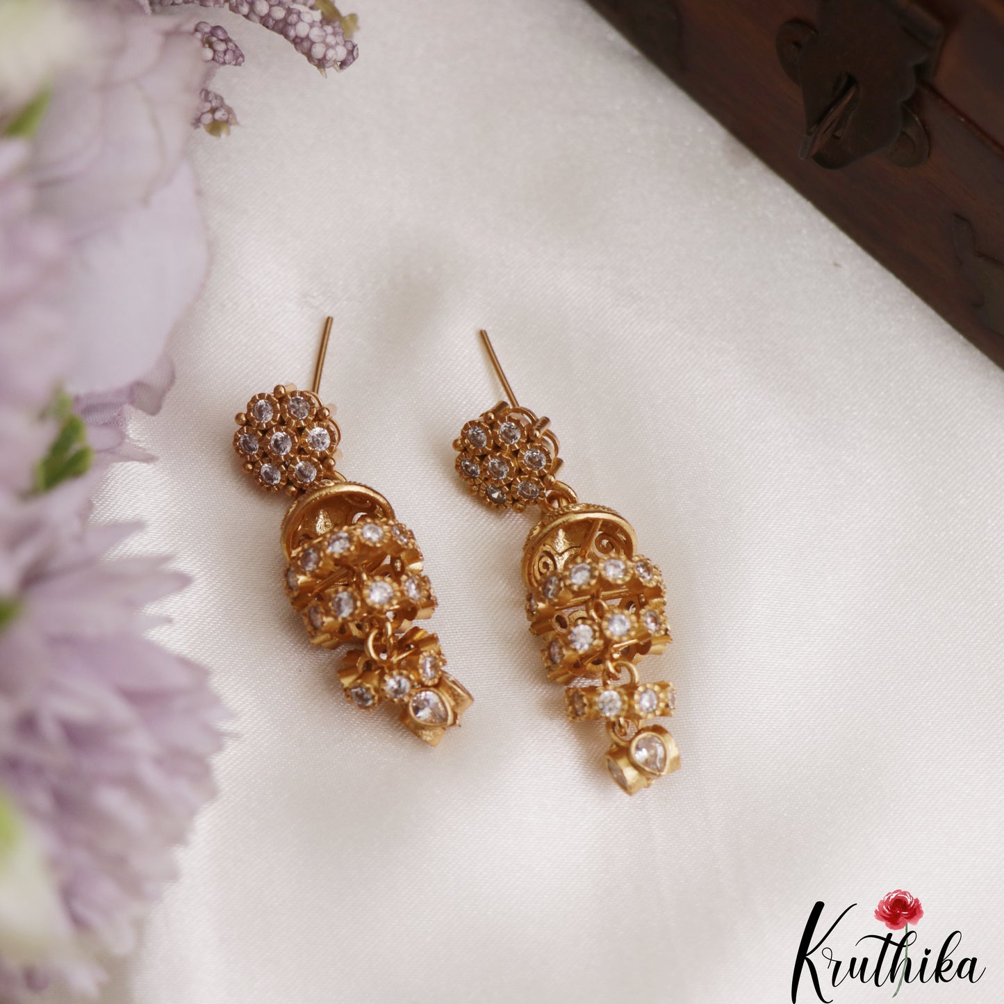 Pretty Antique Floral Motifs CZ Jhumkas E1183