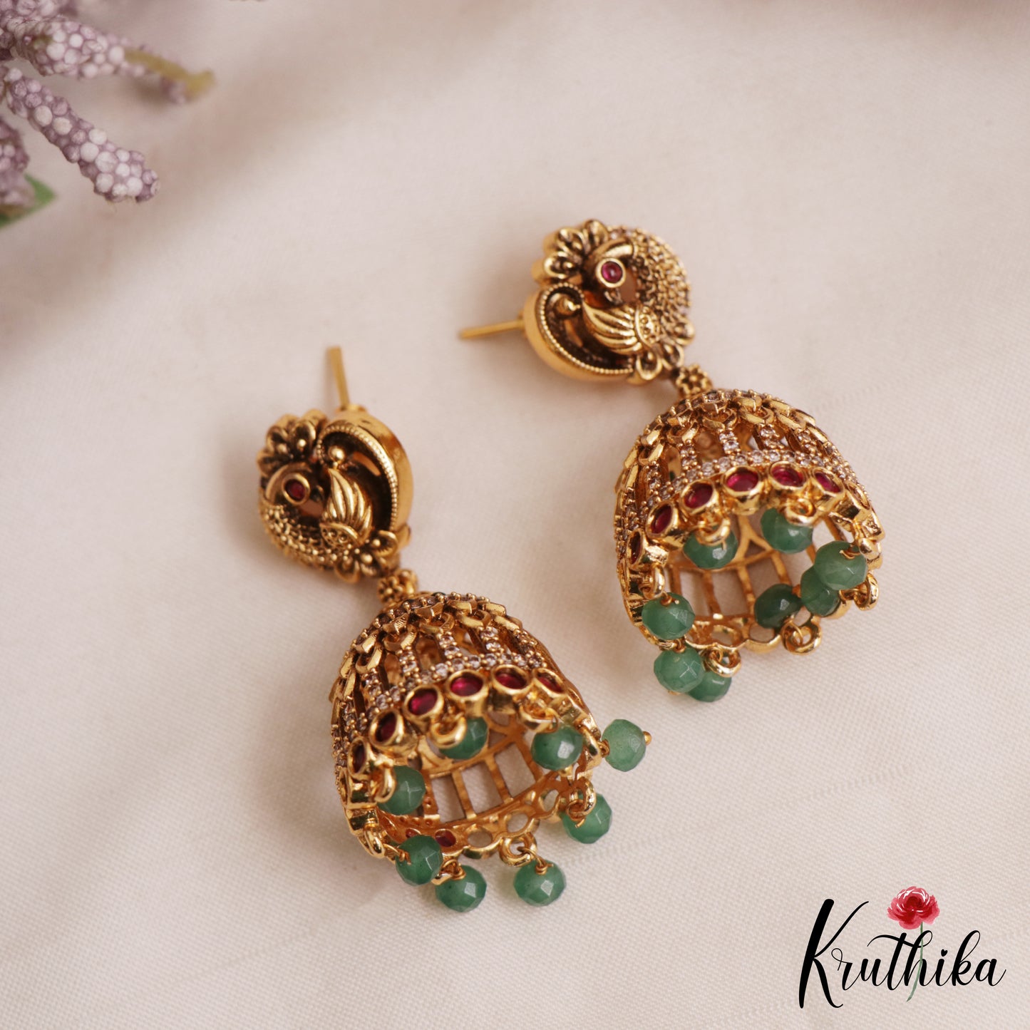 Trendy Antique Peacock Motifs Jadau Jhumkas With Green Bead Drops E1162 (Available In 2 Colors)