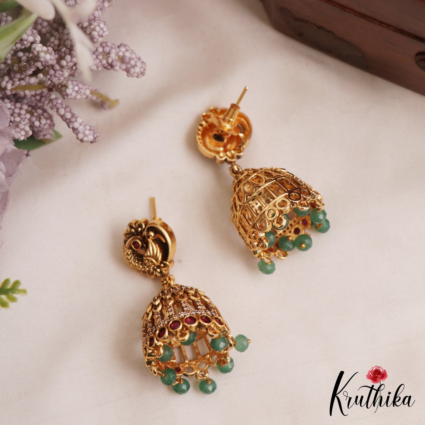 Trendy Antique Peacock Motifs Jadau Jhumkas With Green Bead Drops E1162 (Available In 2 Colors)