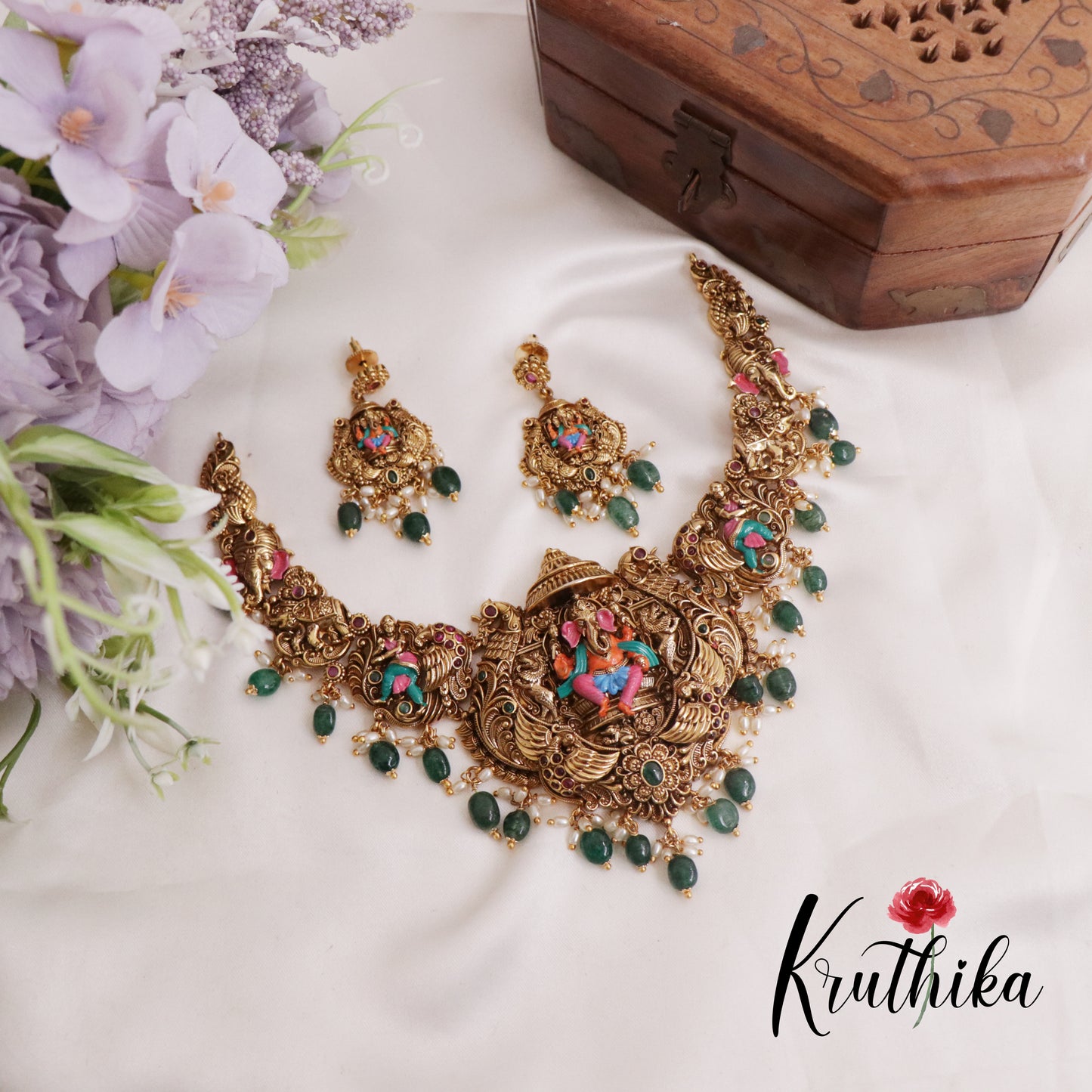 Beautiful Temple Ganesha Pendant Necklace with Peacock Motifs and Green Bead Drops NC2397