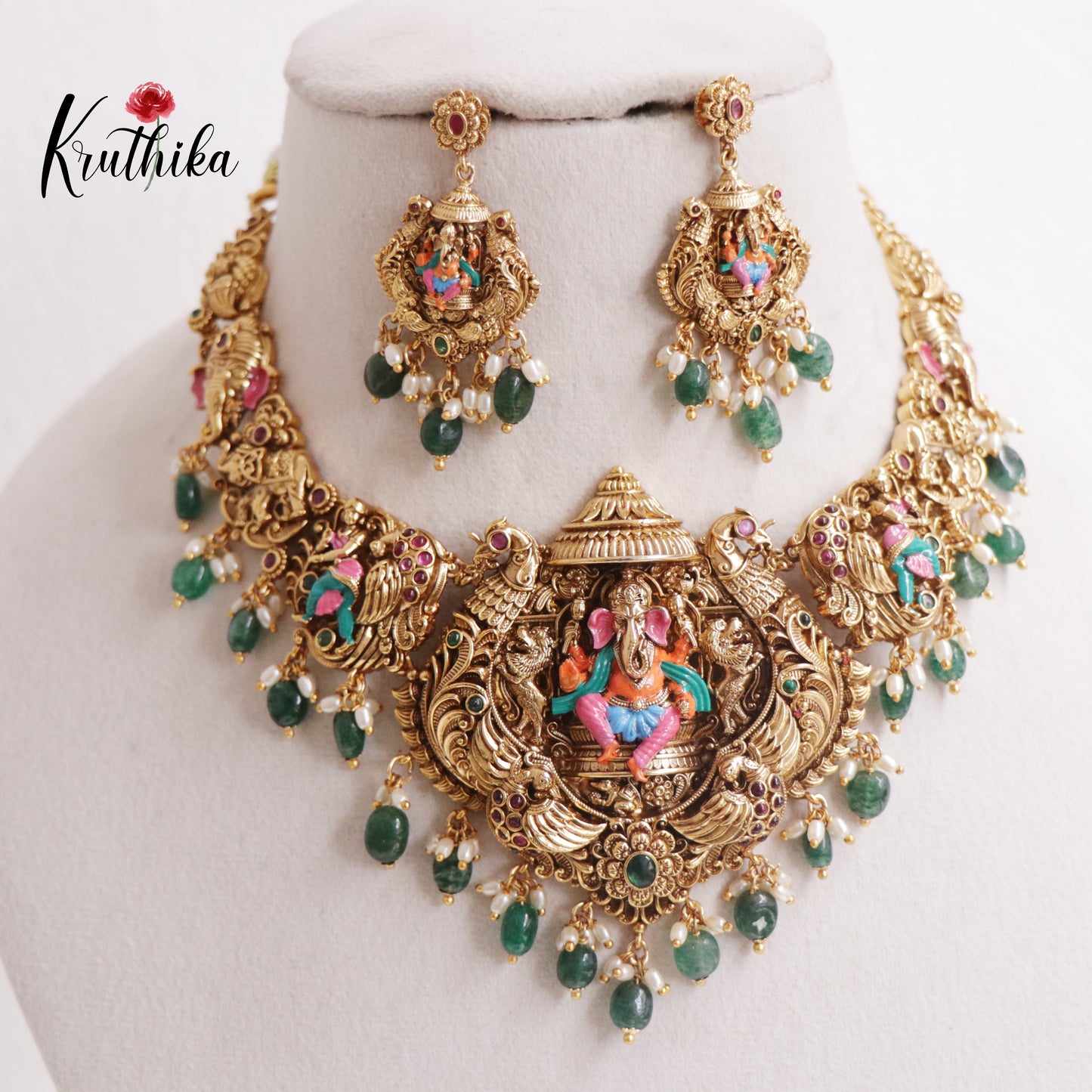 Beautiful Temple Ganesha Pendant Necklace with Peacock Motifs and Green Bead Drops NC2397
