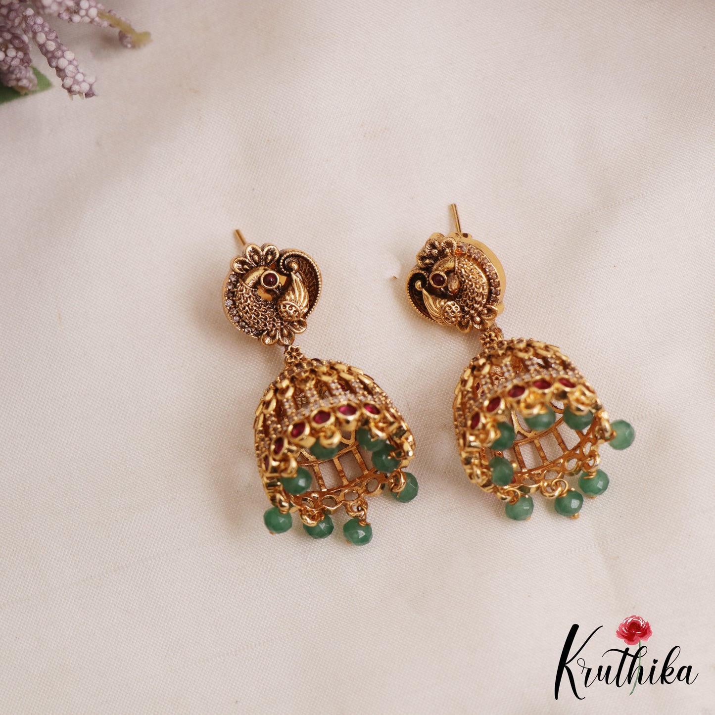 Trendy Antique Peacock Motifs Jadau Jhumkas With Green Bead Drops E1162 (Available In 2 Colors)