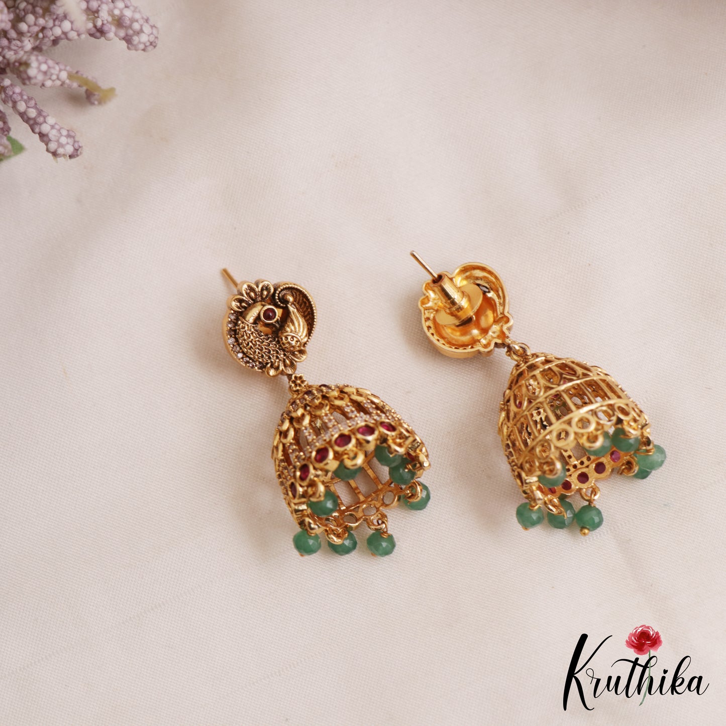 Trendy Antique Peacock Motifs Jadau Jhumkas With Green Bead Drops E1162 (Available In 2 Colors)