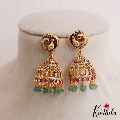 Trendy Antique Peacock Motifs Jadau Jhumkas With Green Bead Drops E1162 (Available In 2 Colors)