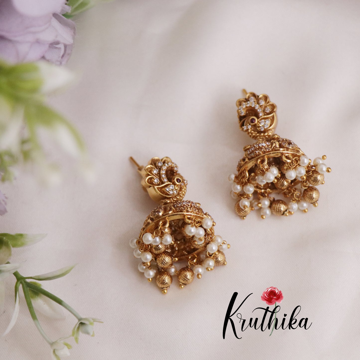 Beautiful Peacock Lakshmi Jhumkas with Pearls and Golden Beads Drops E732