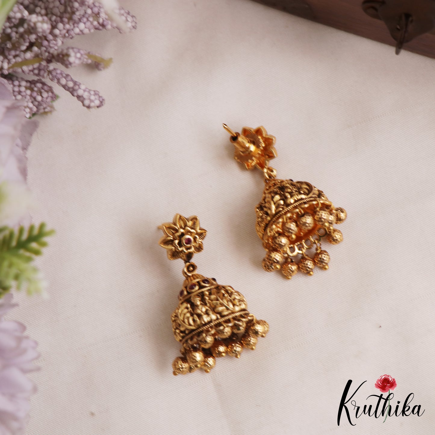Beautiful Antique Floral Lakshmi Motifs Jhumkas With Golden Bead Drops E1166 (Available In 2 Colors)