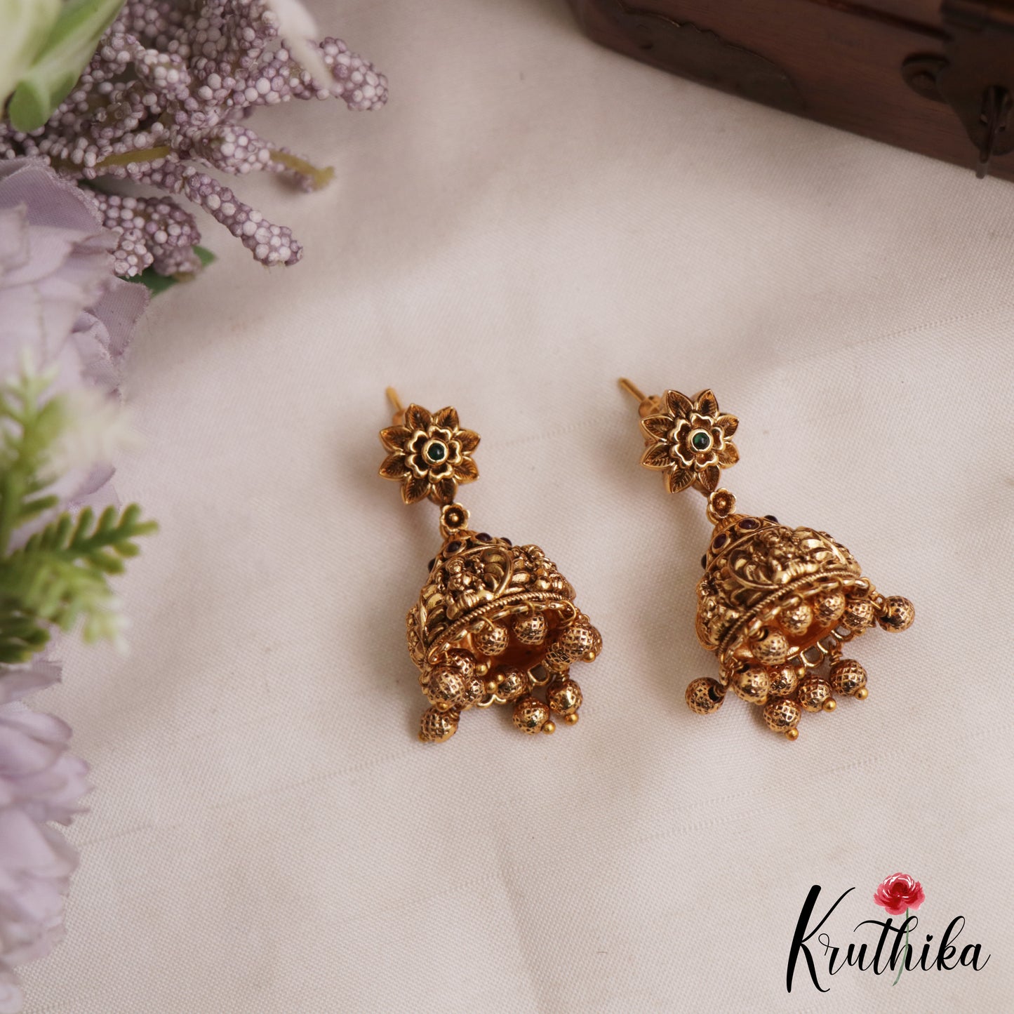 Beautiful Antique Floral Lakshmi Motifs Jhumkas With Golden Bead Drops E1166 (Available In 2 Colors)