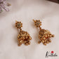 Beautiful Antique Floral Lakshmi Motifs Jhumkas With Golden Bead Drops E1166 (Available In 2 Colors)