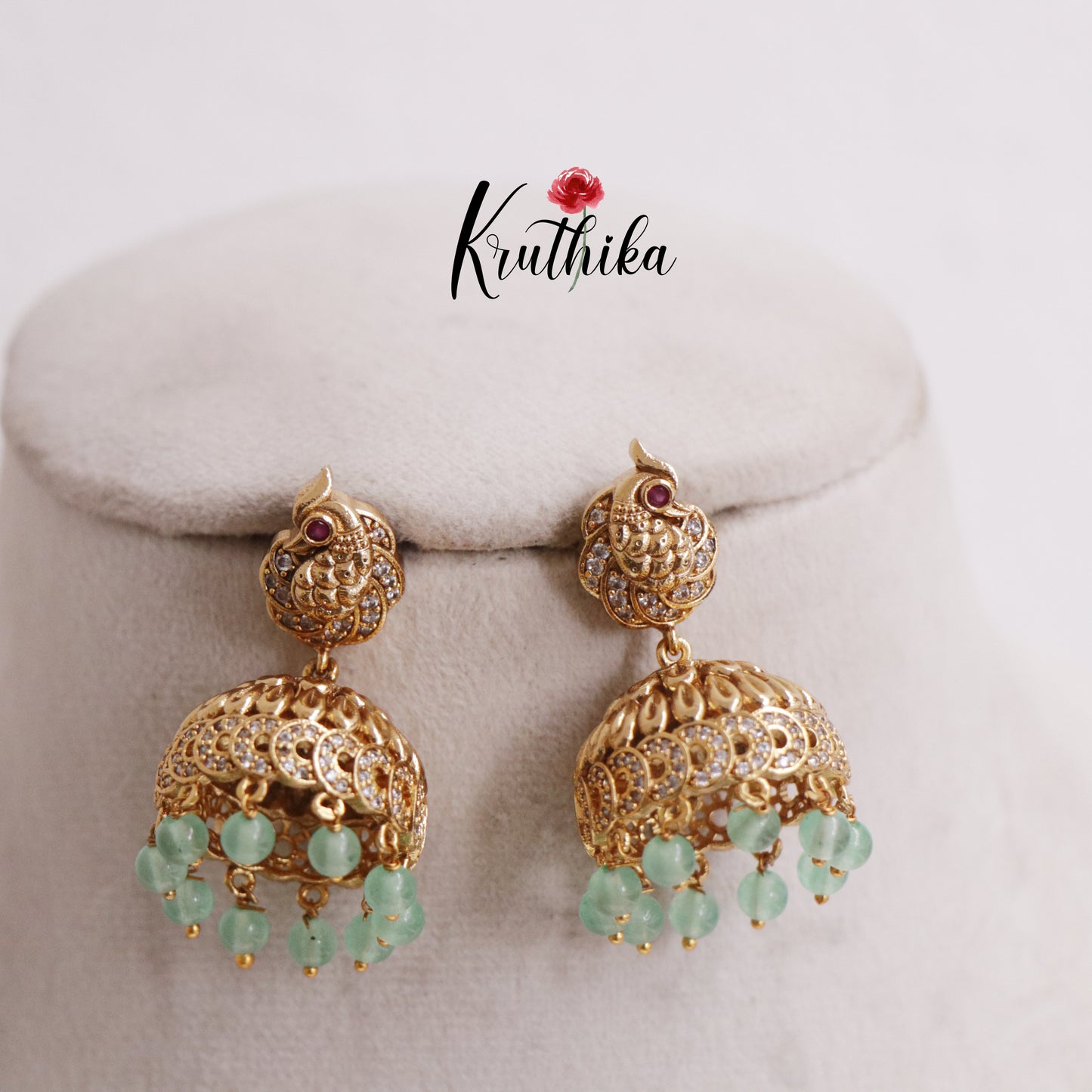 Gorgeous Peacock Jhumkas with Pastel Green Beads Drops E752