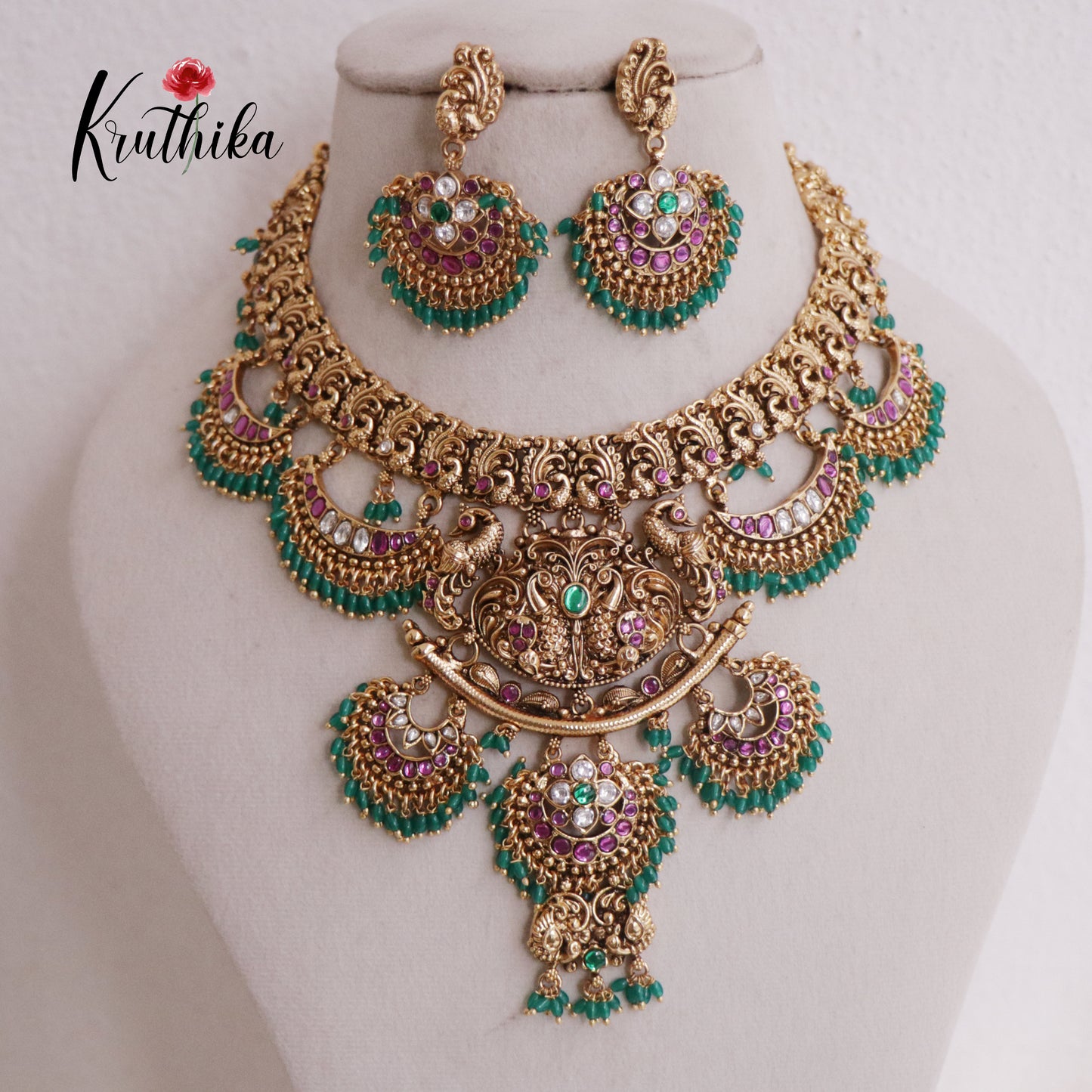 Elegant Budget Friendly Jadau Peacock with Green Beads Drop NC2385