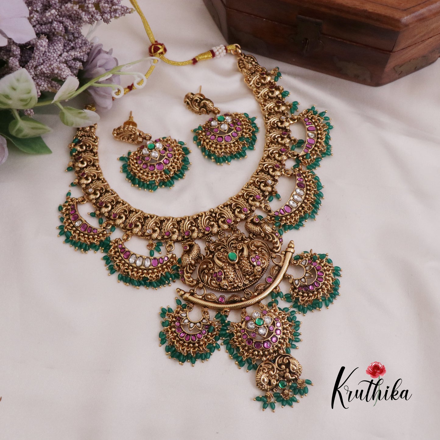 Elegant Budget Friendly Jadau Peacock with Green Beads Drop NC2385