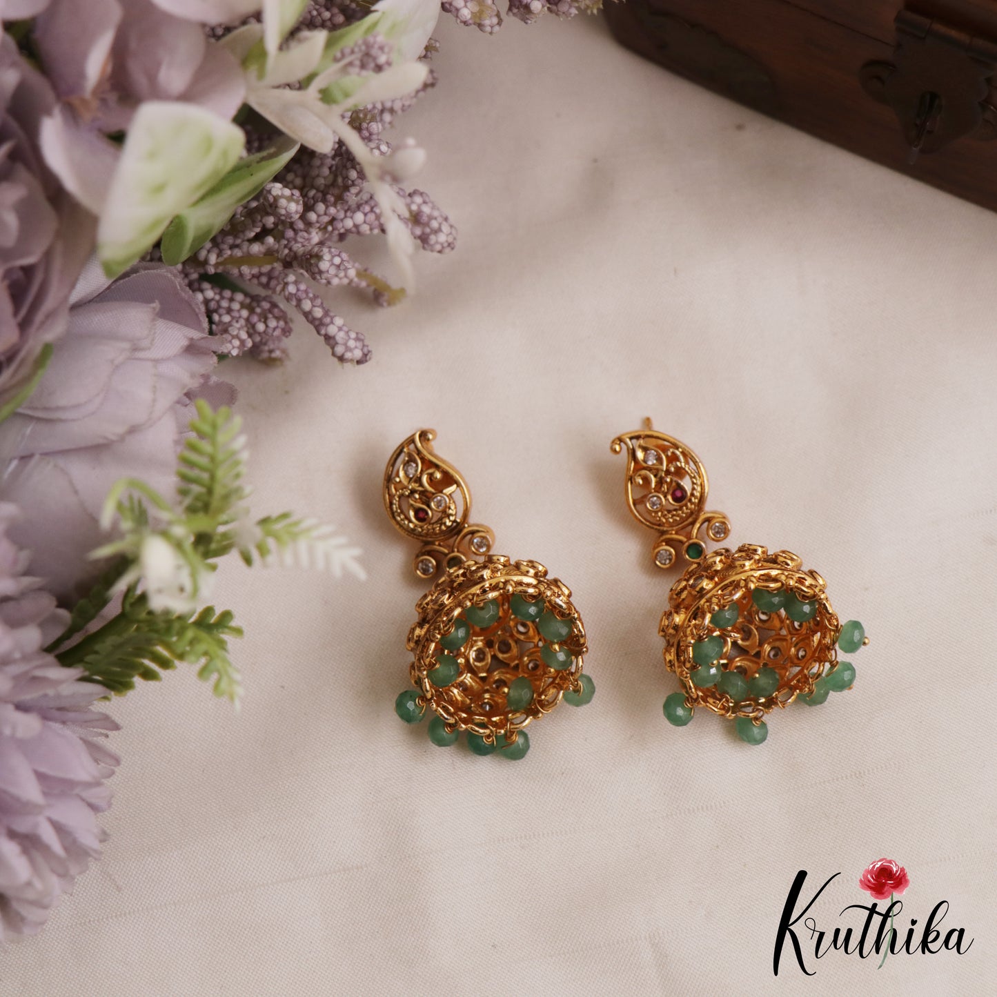 Pretty Antique Mango Motifs Jhumkas With Green Bead Drops E1171