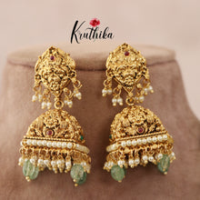 Trendy Peacock Flower Jhumkas with pastel green beads E419