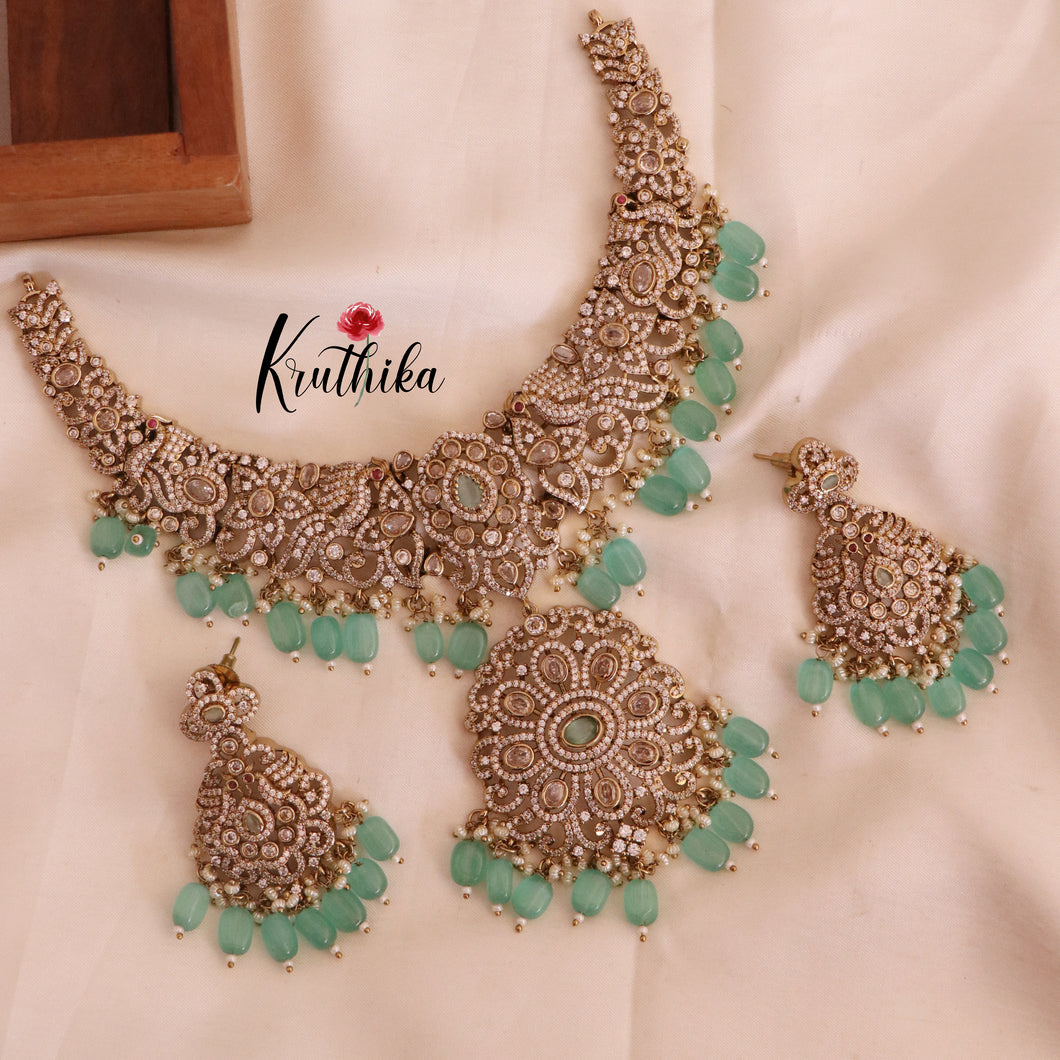 Elegant Premium AD/Victorian Peacock with Sea Green Beads NC1710
