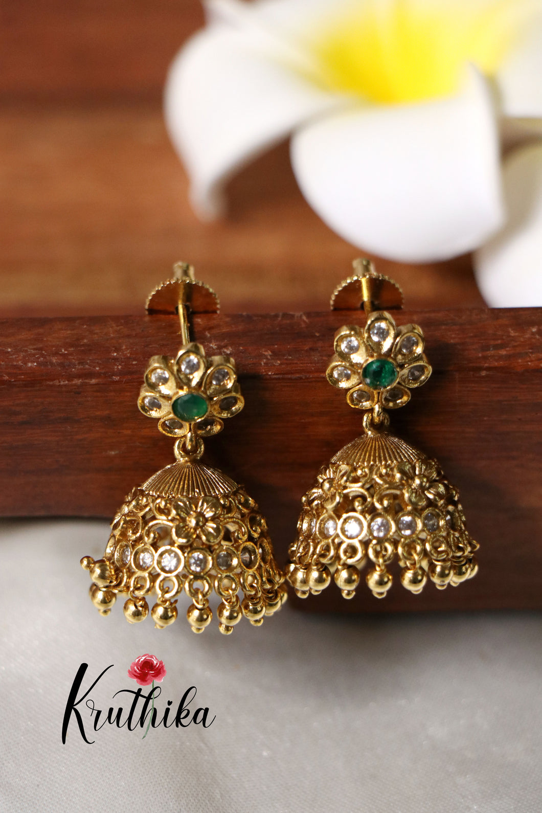 simple AD flower jhumkas with golden bead drops EC390