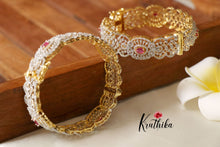 Sparkling CZ gold finish Ruby Bangles B145