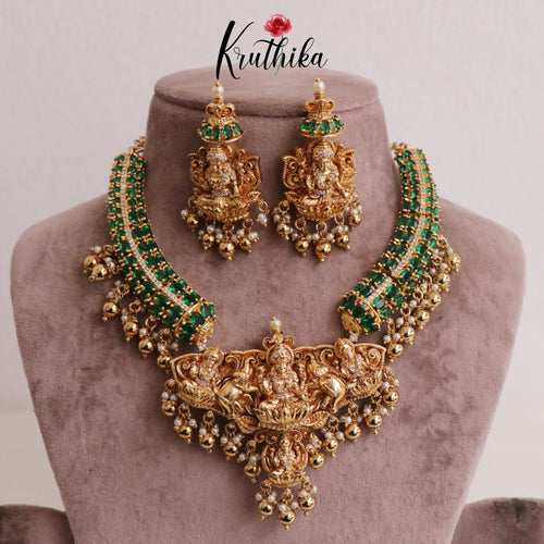 Beautiful Oval Stones CZ Lakshmi Devi Pendant Necklace with Golden Beads Drops (Availabe in 2 Colours) NC1998