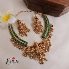 Beautiful Oval Stones CZ Lakshmi Devi Pendant Necklace with Golden Beads Drops (Availabe in 2 Colours) NC1998