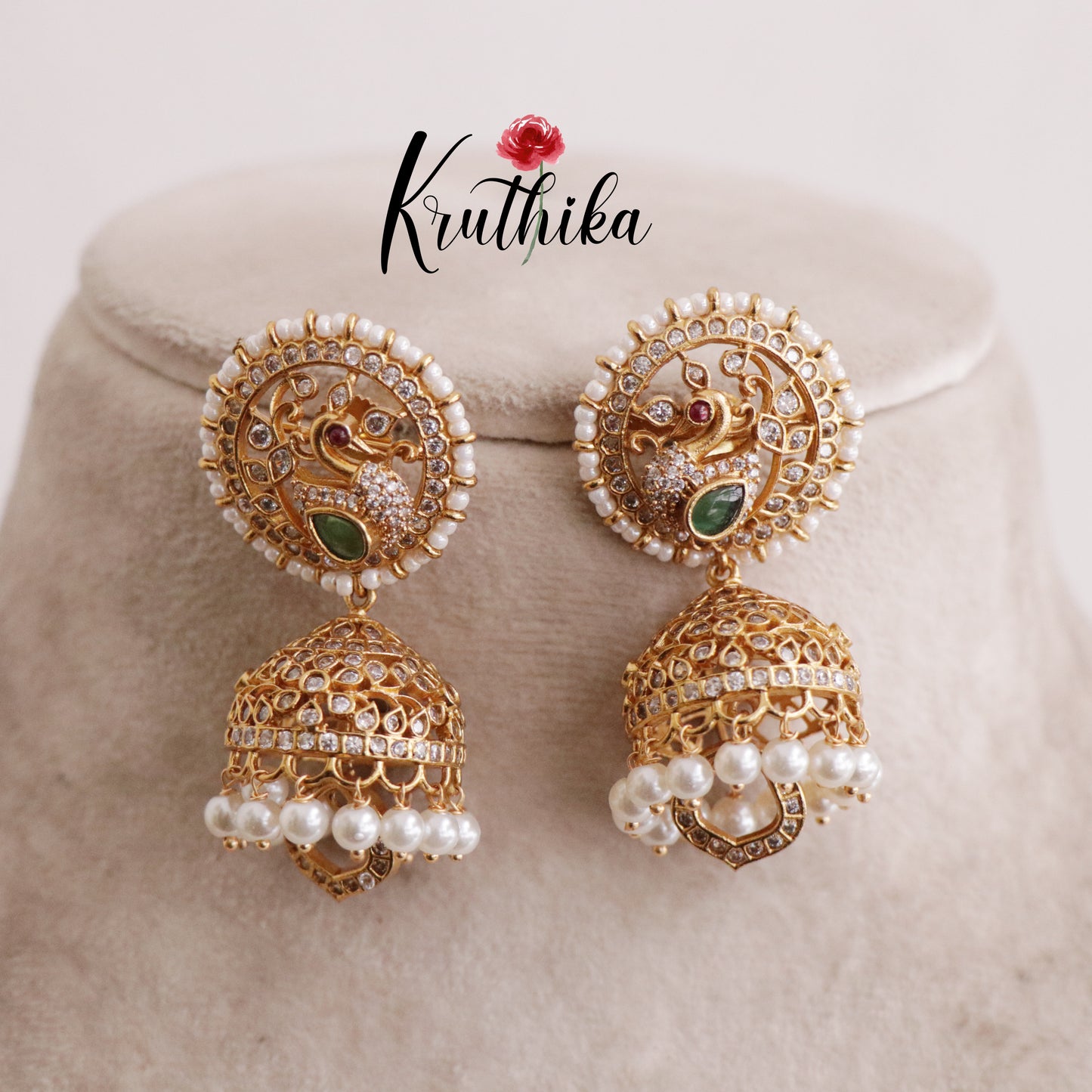 Beautiful Emerald Peacock Pearl Glow Jhumkas E606