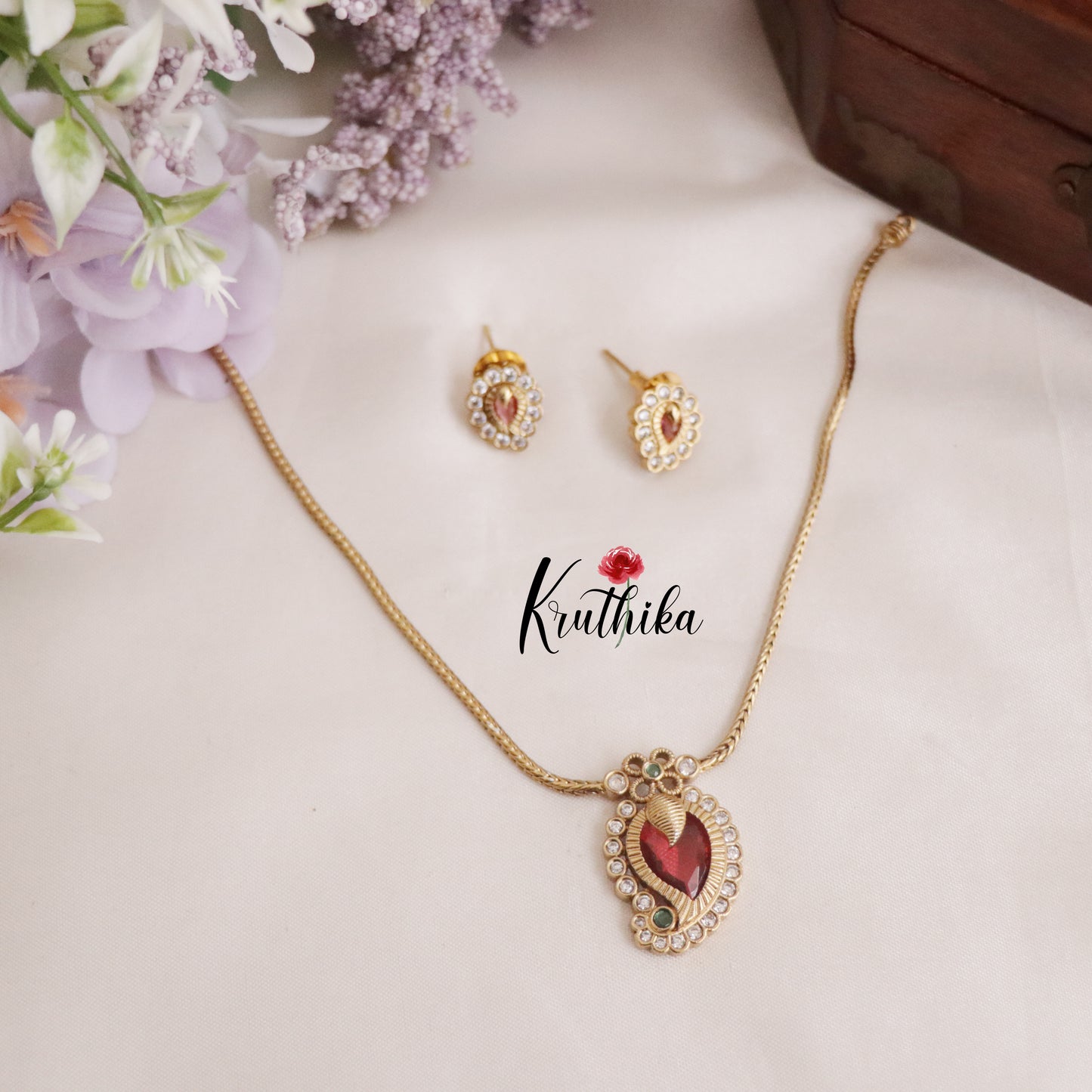 Trendy Ruby Leaf Pendant Chain Set NC2181