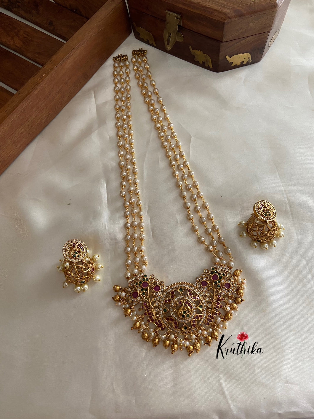 Pearls haaram with AD peacock pendant LH430
