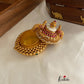 Golden beads peacock kumkuma bharini K1