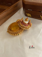 Golden beads peacock kumkuma bharini K1