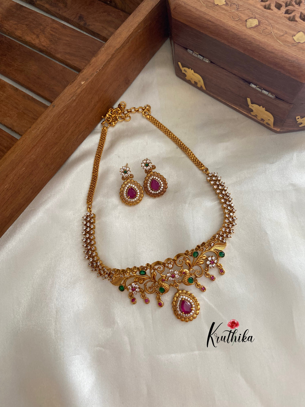 Simple peacock cutwork ruby drop choker NC650