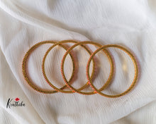 Ruby bangles set of four B66