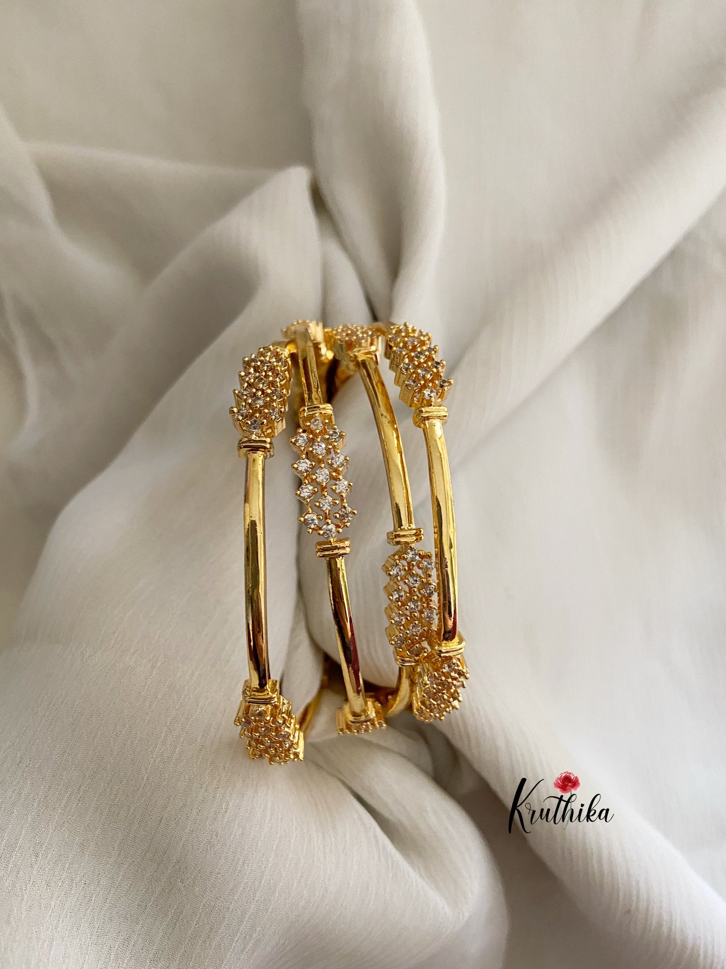 Gold finish cZ bangles B44 (set of 4)