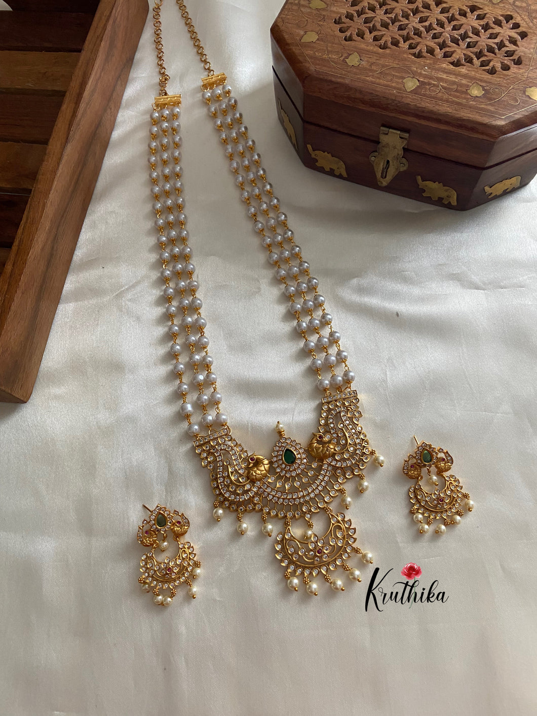 Pearls haaram with AD peacock pendant LH316
