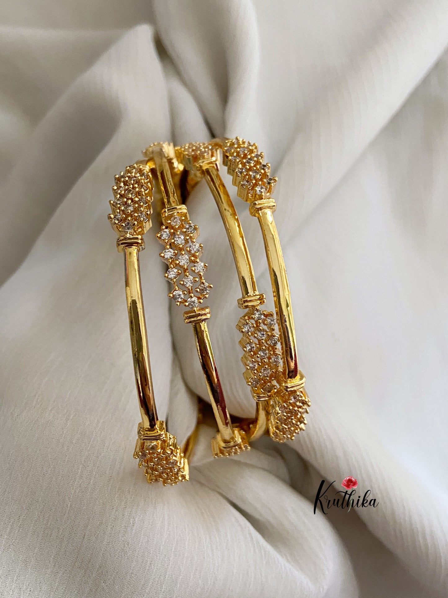 Gold finish cZ bangles B44 (set of 4)