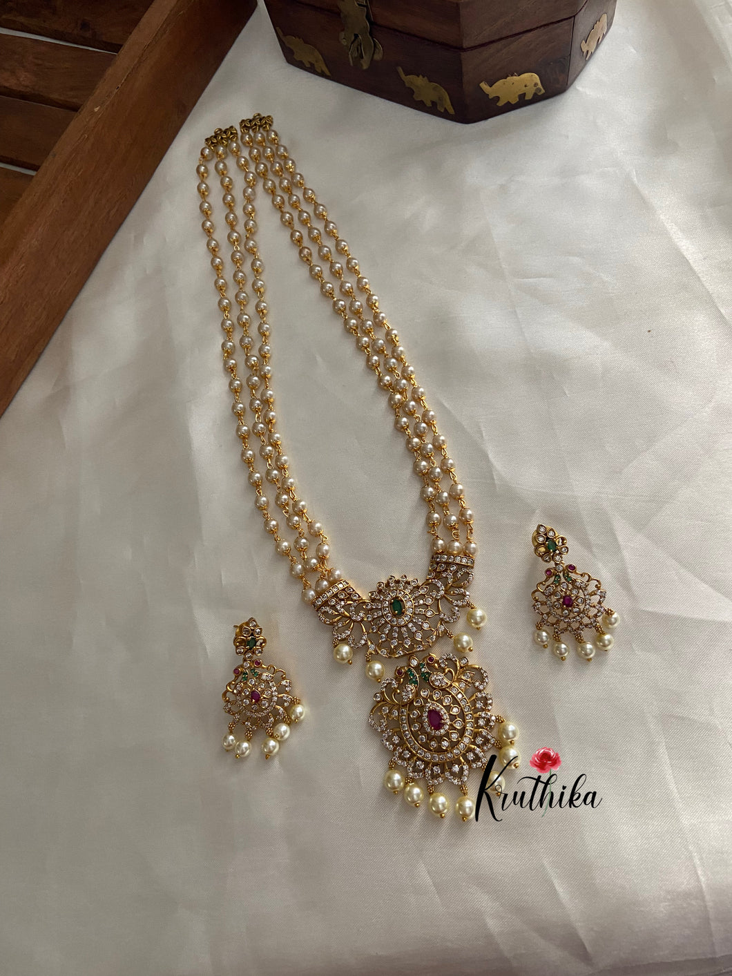 Pearls haaram with AD peacock pendant LH398