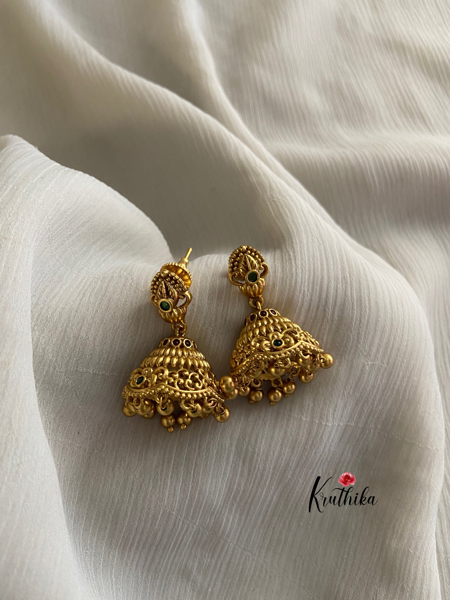 Antique finish emerald Jhumkas E178